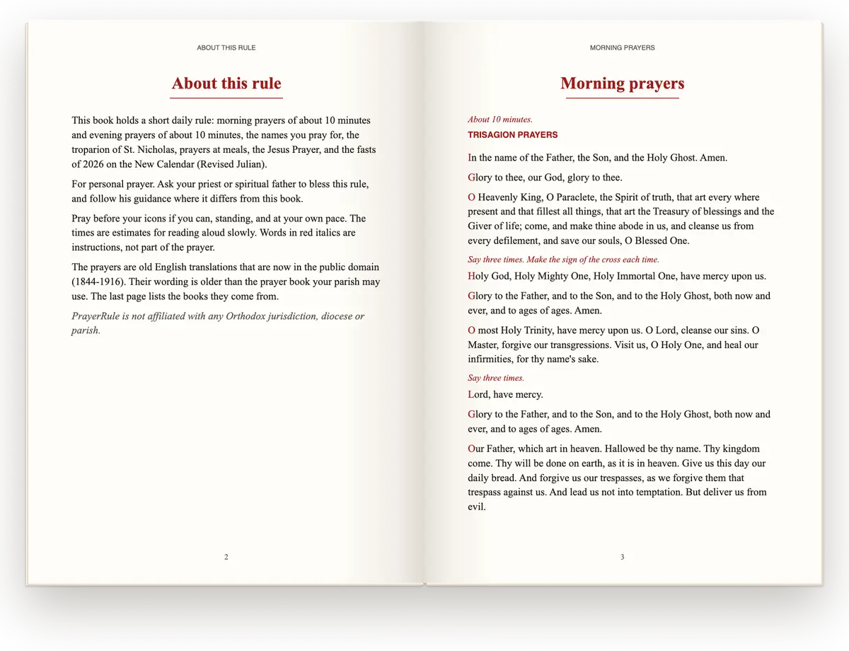 An open A5 PrayerRule book made for St Nicholas. Page 2, About this rule: morning and evening prayers of about 10 minutes, the names you pray for, the troparion of St. Nicholas and the fasts of 2026 on the New Calendar. Page 3, Morning prayers: the Trisagion prayers, each beginning with a red initial, with red instructions such as Say three times.